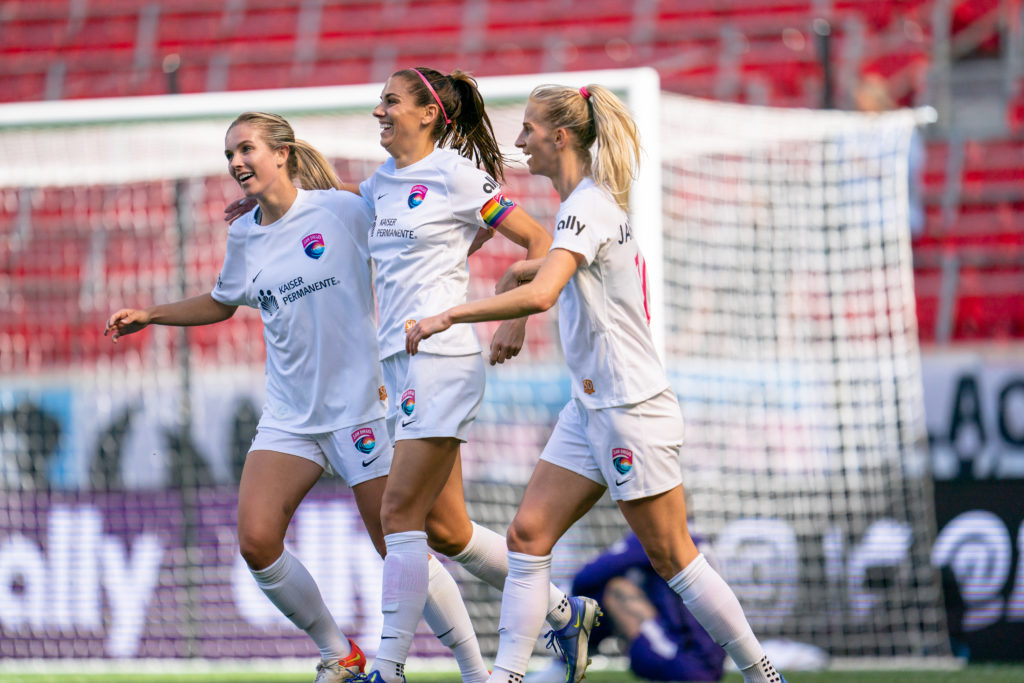 Alex Morgan celebrating with Turnbow and Jakobsson after her 10th career high goal at Gtoham FC